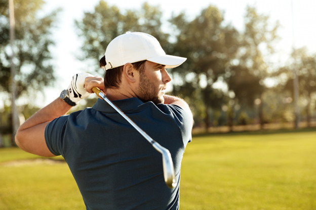 Man playing golf